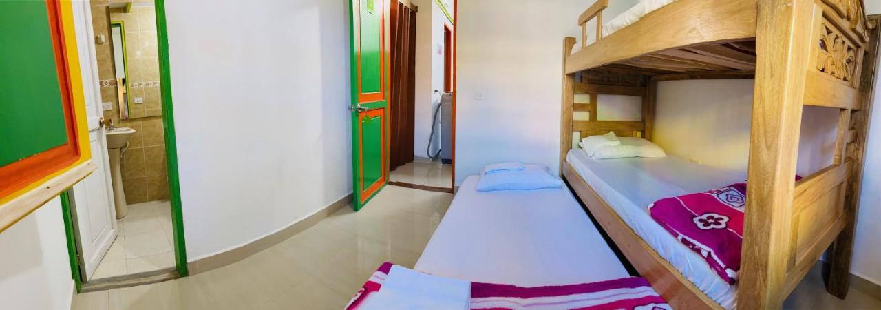 Casa Hostal Las Palmeras กัวตาเป ภายนอก รูปภาพ