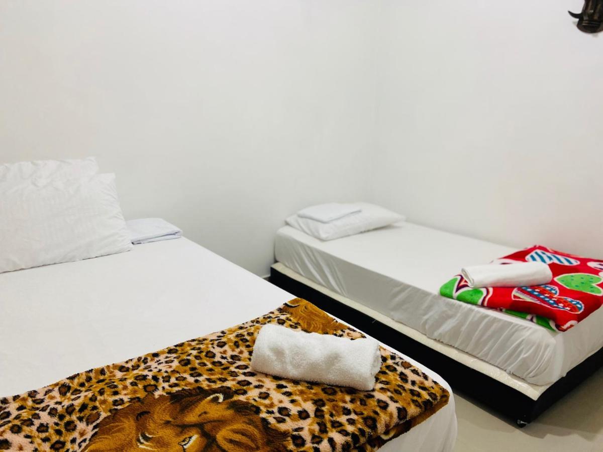 Casa Hostal Las Palmeras กัวตาเป ภายนอก รูปภาพ